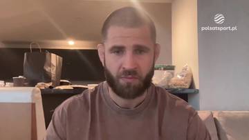 Portret Jiřiego Procházki, zawodnika MMA, z widoczną brodą, w brązowej koszulce.