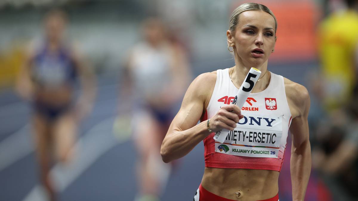 Lekkoatletka Justyna Święty-Ersetic biegnie na bieżni podczas zawod&oacute;w.