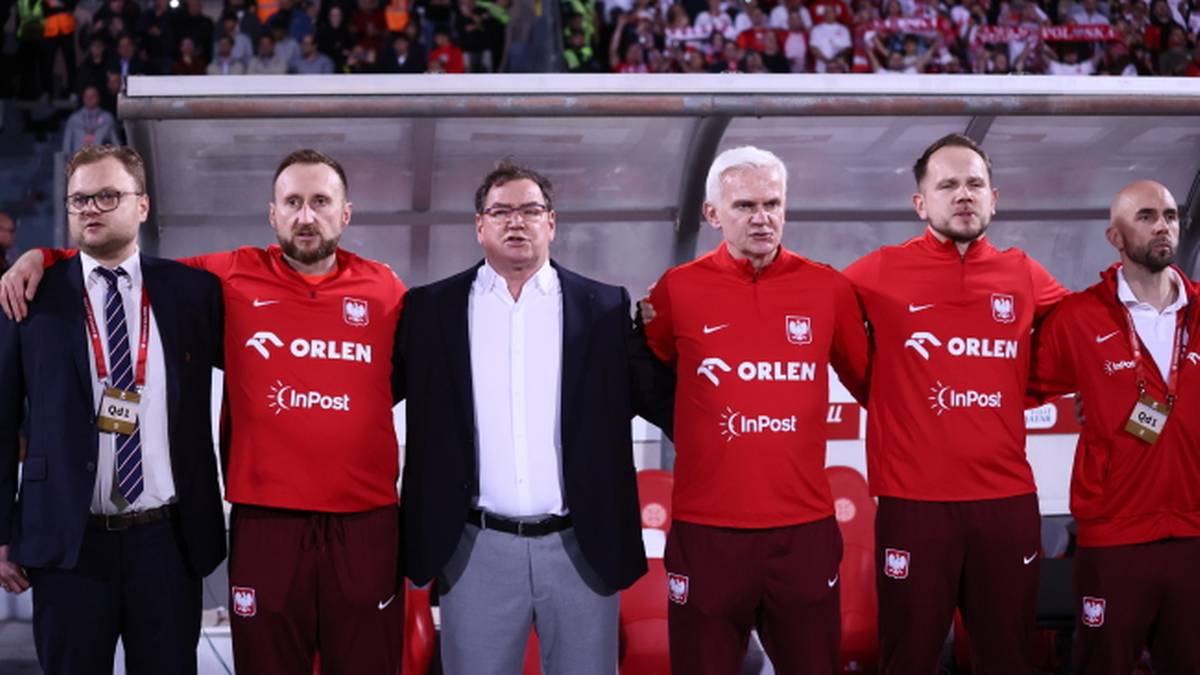 Szkoleniowcy reprezentacji Polski w strojach sportowych