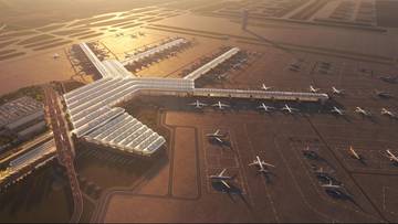 Wizualizacja architektoniczna lotniska Centralnego Portu Komunikacyjnego (CPK) z perspektywy lotu ptaka, z widocznymi pasami startowymi, terminalem, płyta postojowa z zaparkowanymi samolotami oraz otaczającą infrastrukturą.