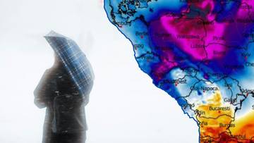 Sylwetka osoby pod parasolem na tle mapy Europy Środkowej pokazującej obszary niskich temperatur.