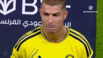 Cristiano Ronaldo w ż&oacute;łto-czarnym stroju sportowym klubu Al-Nassr z widoczną determinacją na twarzy.
