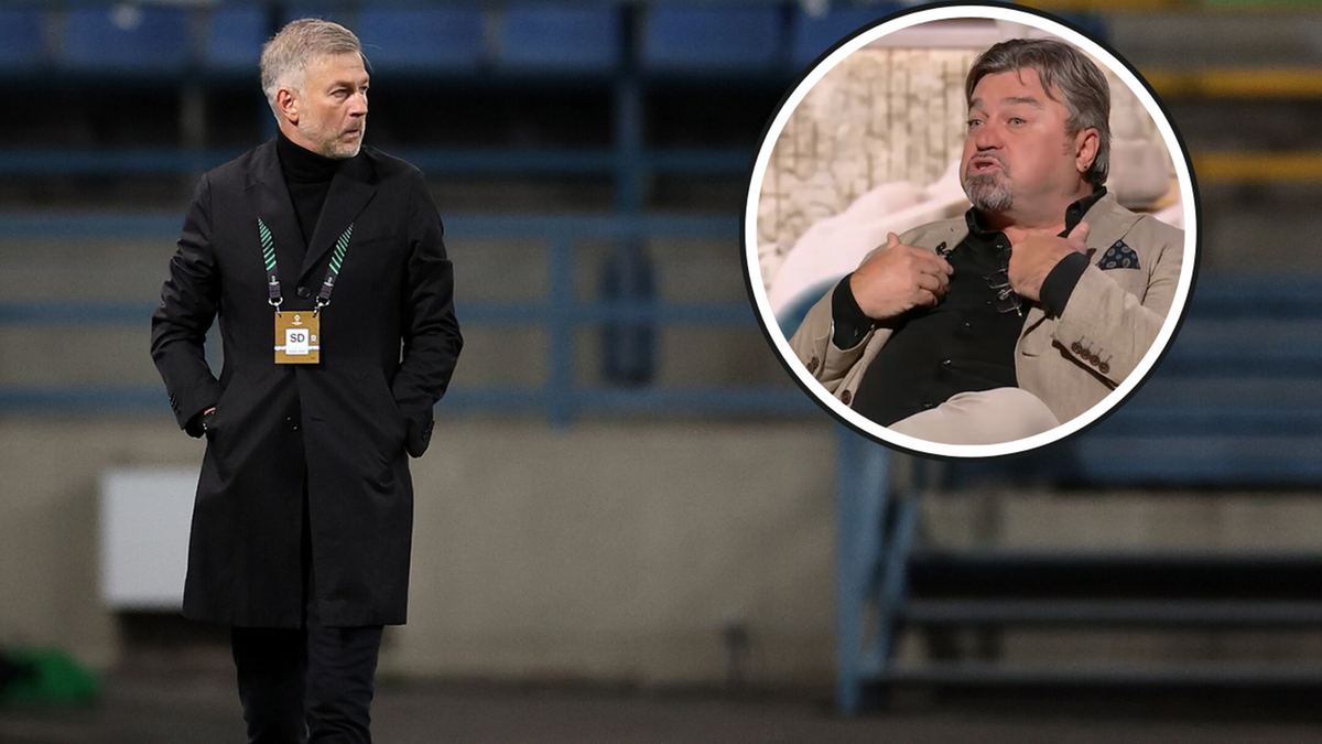 Trener piłkarski w czarnym płaszczu i golfie na tle stadionu, obok mężczyzna w jasnej marynarce w okrągłym kadrze.