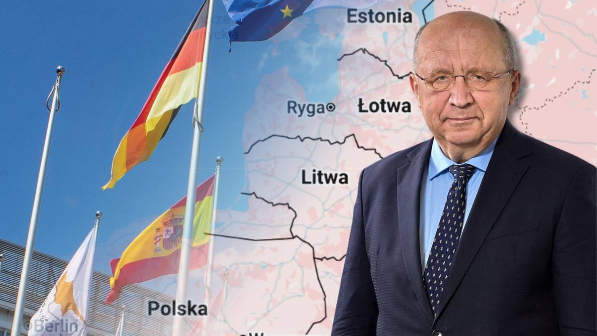 Andrius Kubilius, europejski komisarz do spraw obrony, stoi na tle flag państw bałtyckich i mapy Europy z zaznaczonym regionem bałtyckim.