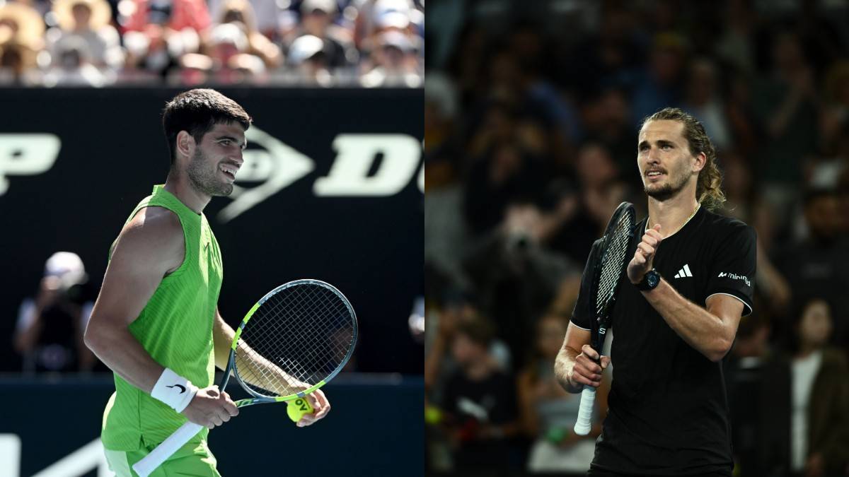 Dw&oacute;ch tenisist&oacute;w na korcie, jeden w zielonej koszulce, drugi w czarnej