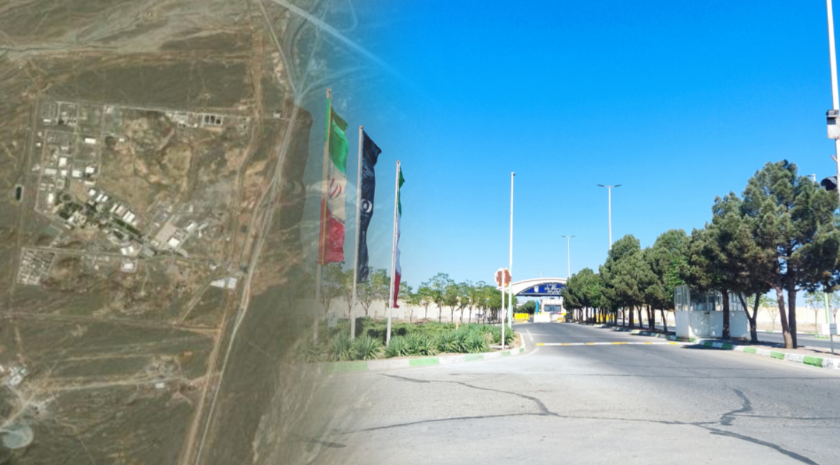 Widok lotniczy kompleksu przemysłowego oraz droga wjazdowa z flagami Iranu.