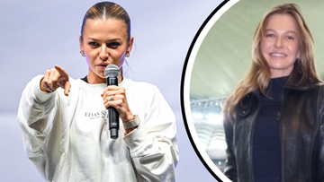 Anna Lewandowska przemawiająca do mikrofonu i stojąca na tle stadionu.