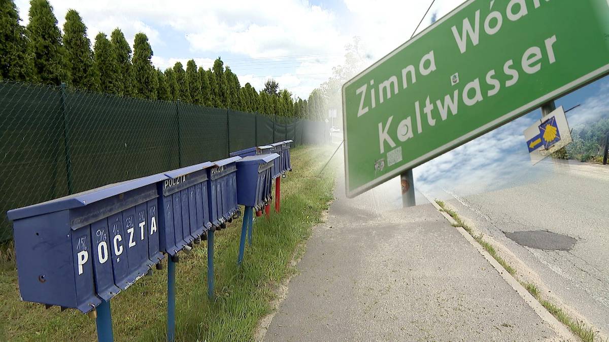Rządowa skrzynka pocztowa obok znaku drogowego z napisem Zimna Wódka Kaltwasser