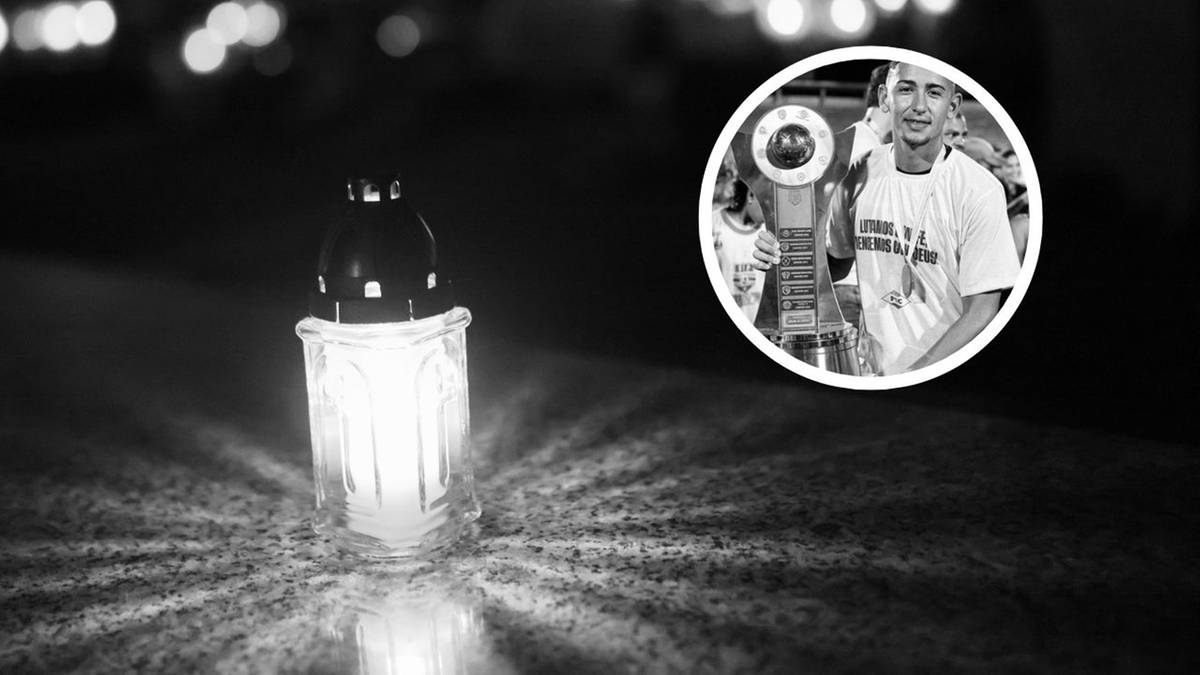 Znicz płonący na ciemnym tle. W prawym górnym rogu w okręgu zdjęcie młodego mężczyzny.