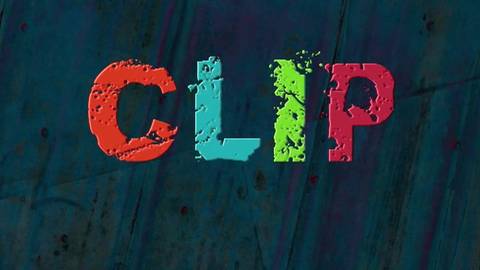 Napis "CLIP" wykonany z kolorowych, postrzępionych liter na ciemnym tle.