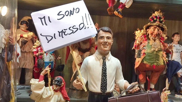 Premier Włoch z walizką w szopce w Neapolu