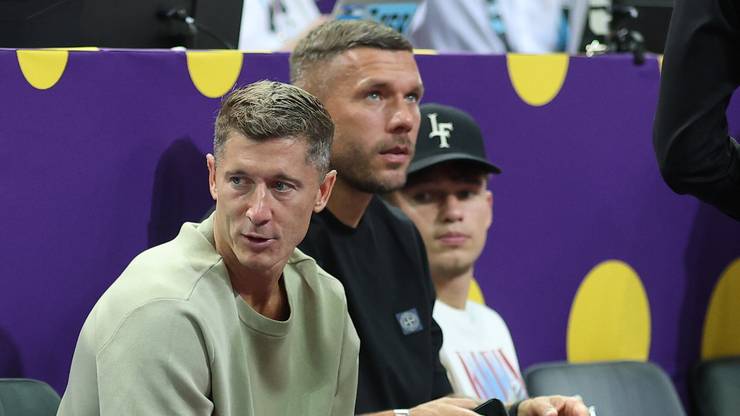 Piłkarze reprezentacji Polski na meczu koszykarzy