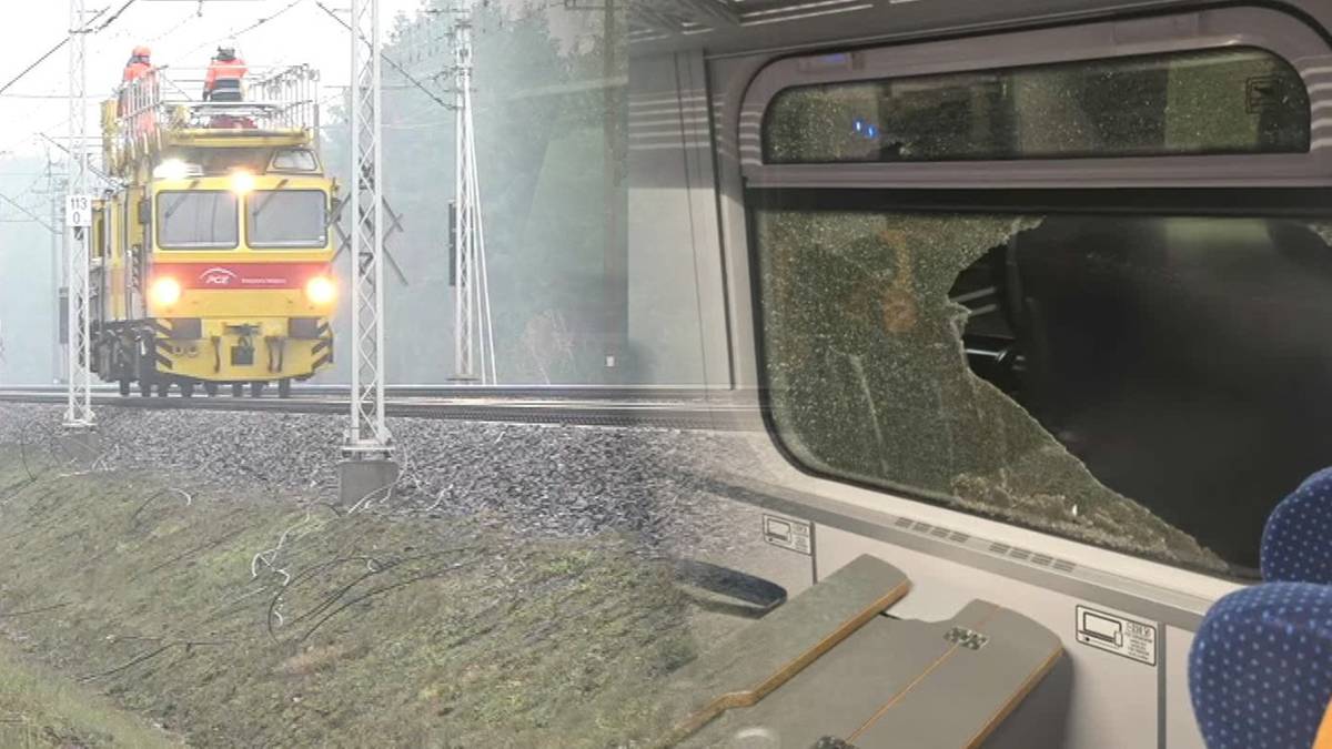 Żółty pojazd kolejowy naprawiający trakcję obok uszkodzonego wagonu z wybitym oknem.