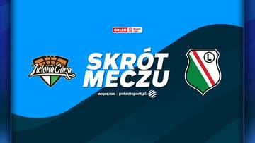 Grafika z napisem "SKR&Oacute;T MECZU" pomiędzy logiem Zastal Zielona G&oacute;ra i herbem Legii Warszawa, zapowiadająca relację sportową.