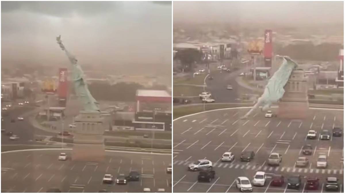 Replika Statuy Wolności przewracająca się pod wpływem silnego wiatru.