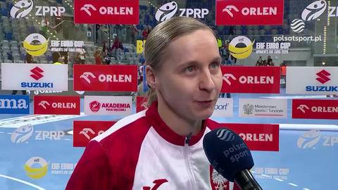 Joanna Gadzina udziela wywiadu, w tle banery z logo sponsor&oacute;w i napisem "EURO CUP".