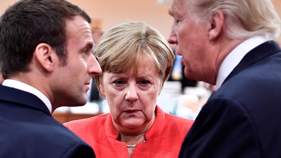 Emmanuel Macron (po lewej), Angela Merekl (w środku), Donald Trump (po prawej). Fot. REUTERS / John MacDougall.