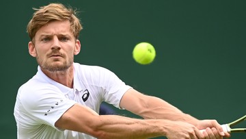 Wimbledon: Belg z awansem po czterech setach