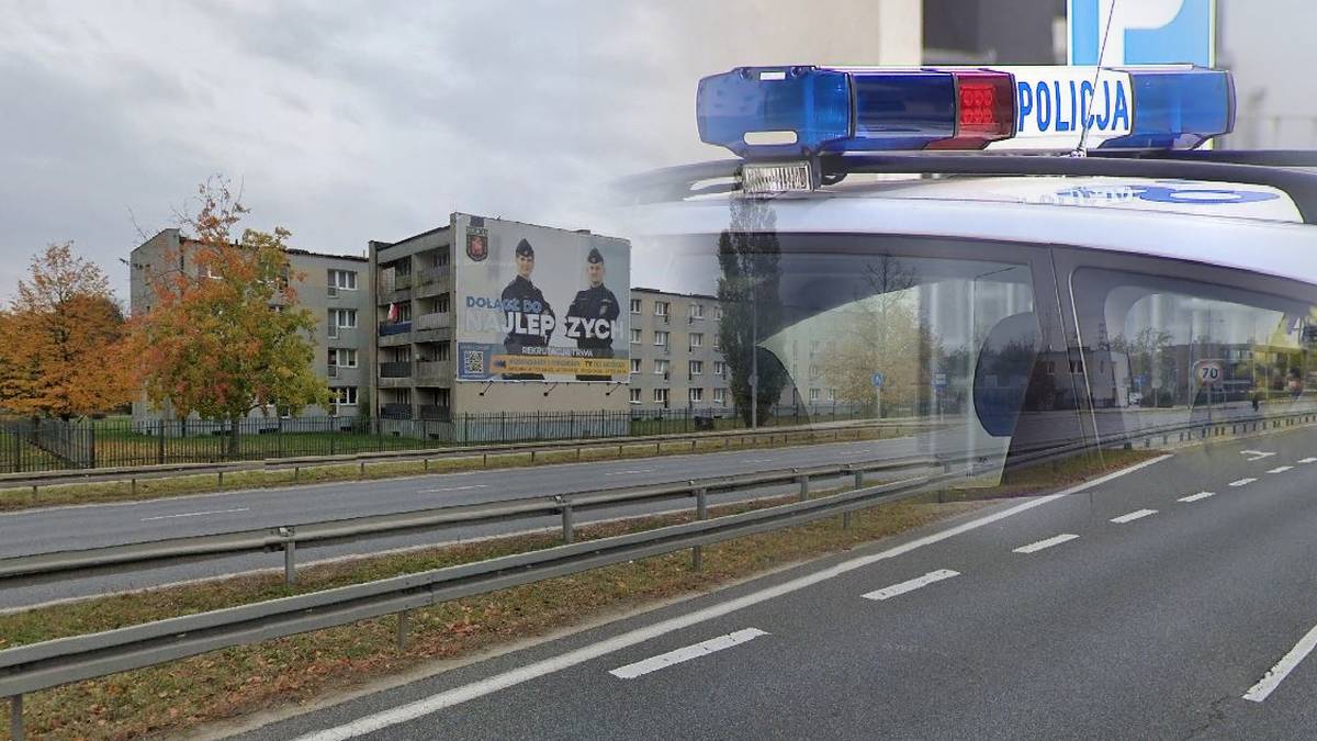 Nakładka zdjęcia z policyjnym radiowozem z zapalonymi sygnałami świetlnymi na tle budynku mieszkalnego z billboardem.