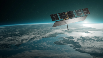 Satelita wojskowy z rozłożonymi panelami słonecznymi na tle Ziemi i Słońca w przestrzeni kosmicznej.