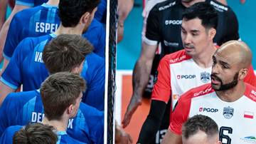 Siatkarze w strojach klubowych podczas meczu Ligi Mistrz&oacute;w, skupieni na grze.