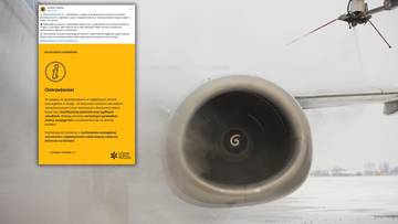 Fragment samolotu z widocznym silnikiem i kartką informacyjną o ostrzeżeniu pogodowym.