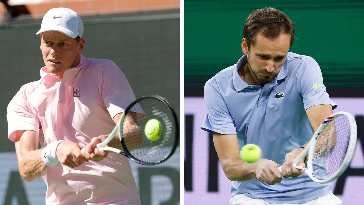 Dwaj tenisiści z rakietami tenisowymi, gotowi do uderzenia piłki.